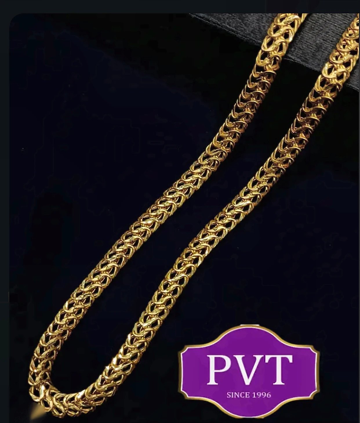 Heavy gold link chain with an intricate woven pattern